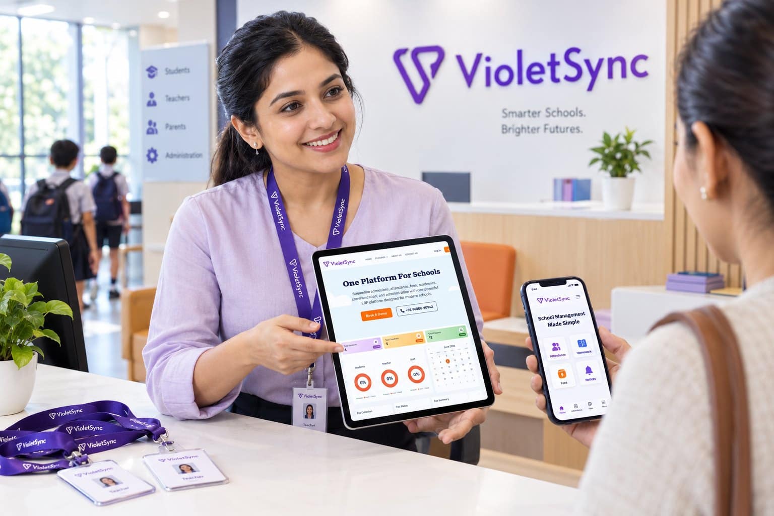 VioletSync school reception with the VioletSync wall sign, a teacher showing the attendance dashboard on a tablet and the parent app on a phone
